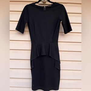 Theory black bodycon midi dress. Short sleeves, front waist valance, zipper, 2
